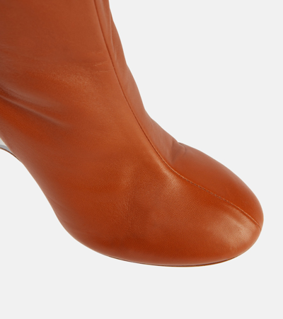 Alaïa Leather Knee-high Boots In Brown