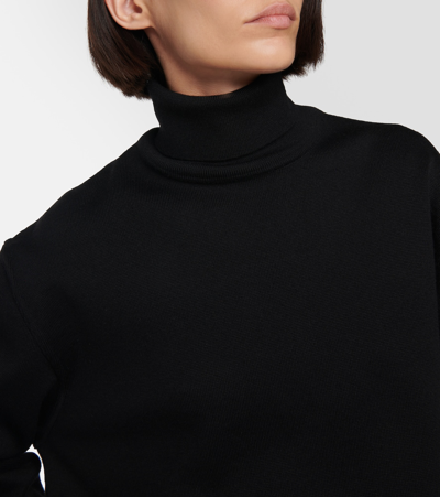 Shop Alaïa Wool-blend Turtleneck Sweater In Black