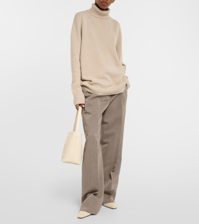 The Row Stepny Oversized Wool And Cashmere-blend Turtleneck Sweater In Beige