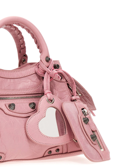 Shop Balenciaga Neo Cagole Xs Handbag In Powder Pink