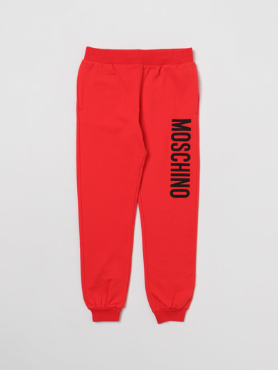 Shop Moschino Kid Pants In Cotton In Red