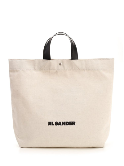 Shop Jil Sander Logo Printed Large Tote Bag In Beige
