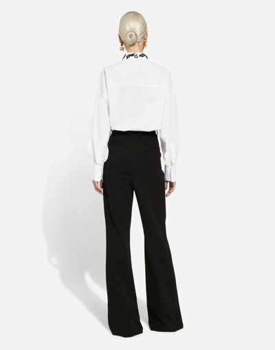 Shop Dolce & Gabbana Flared Jersey Milano Rib Pants In Black