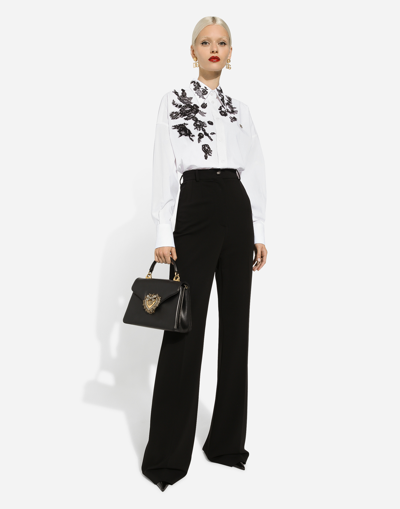 Shop Dolce & Gabbana Flared Jersey Milano Rib Pants In Black