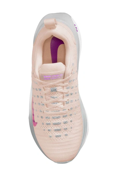 Shop Nike Infinityrn 4 Running Shoe In Guava/ Purple/ White