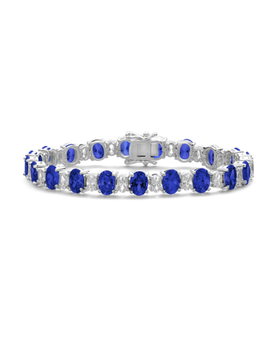 Shop Genevive Sterling Silver White Gold Plated With Oval Cubic Zirconia Tennis Bracelet In Blue