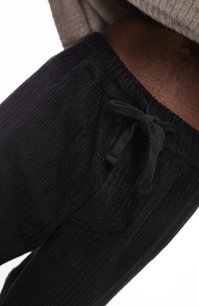 Shop Topman Corduroy Wide Leg Pants In Black