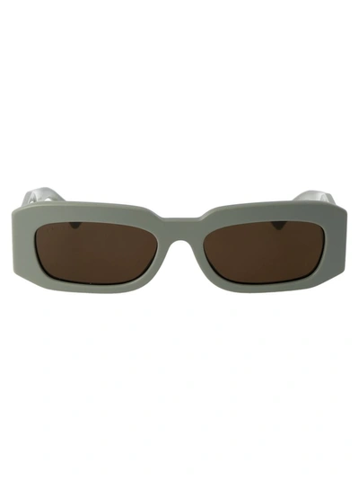 Shop Gucci Sunglasses In 004 Green Green Brown