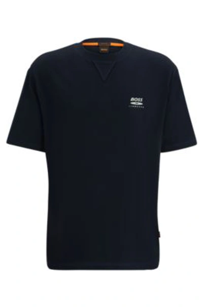 Shop Hugo Boss Cotton-jersey Oversized-fit T-shirt With Seasonal Artwork In Dark Blue