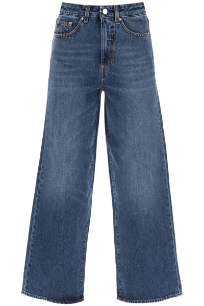 Shop Totême Cropped Flare Jeans In Blue
