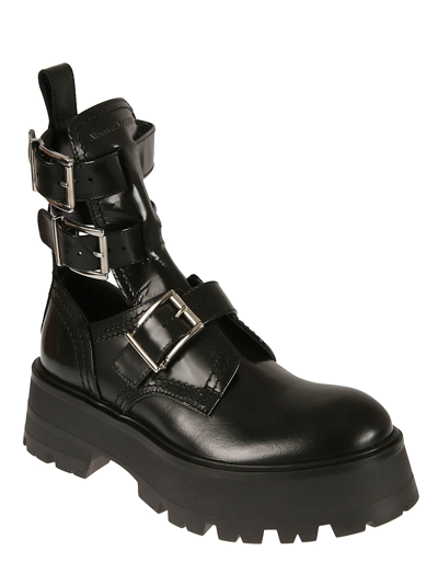 Shop Alexander Mcqueen Multi Side Buckled Leather Boots In Black/silver