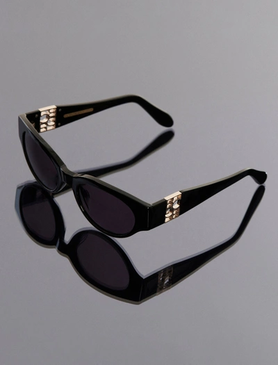 Shop Bcbgmaxazria Signature Oval Icon Sunglasses In Black