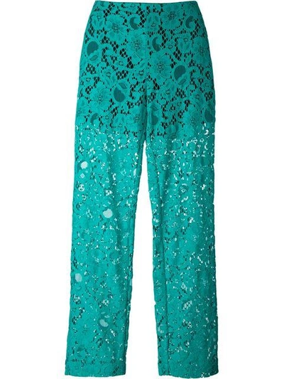 Shop Msgm Semi-sheer Lace Trousers In Green