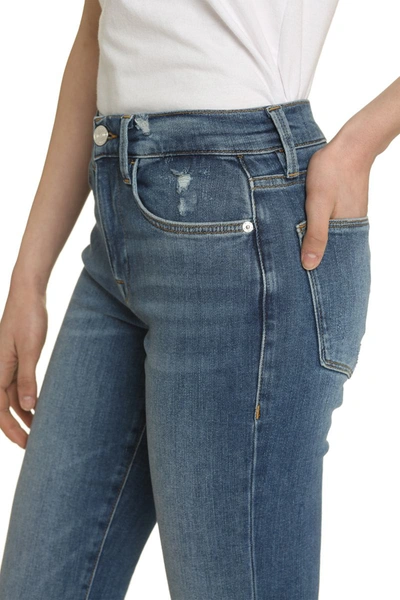 Shop Frame High-rise Flared Jeans In Denim