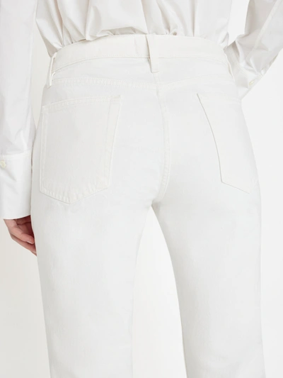 Shop Frame The Low Bootcut Jeans In White