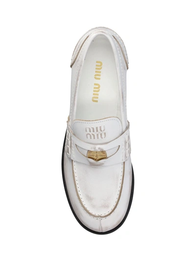 Shop Miu Miu Flat Shoes In White