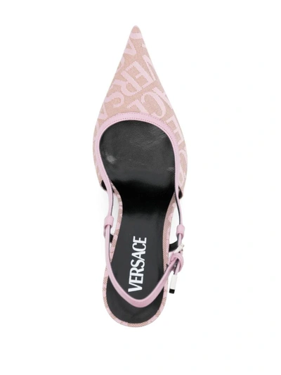 Shop Versace Sandals In Beige/pink