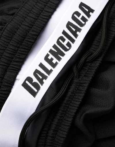Shop Balenciaga Logo Waistband Swim Shorts In Black