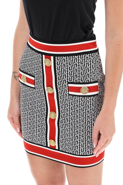Shop Balmain Mini Skirt In Monogram Knit