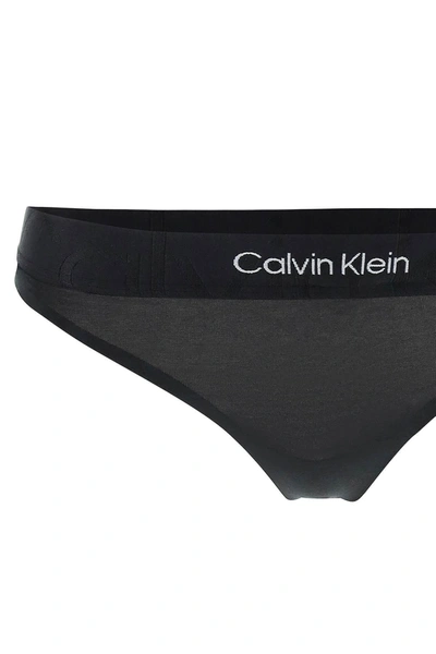 Shop Calvin Klein Underwear Embossed Icon Thong
