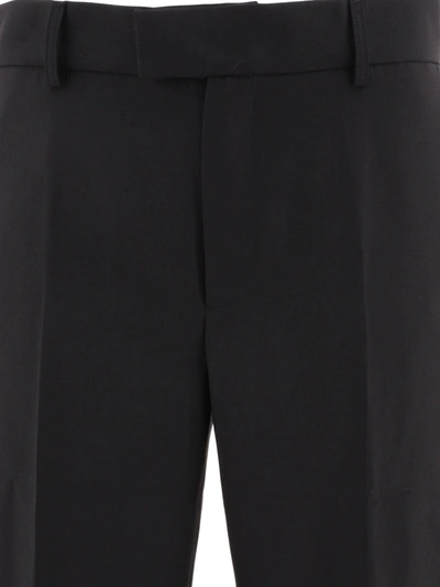 Shop Dolce & Gabbana Technical Fabric Pants With Metal Dg Logo
