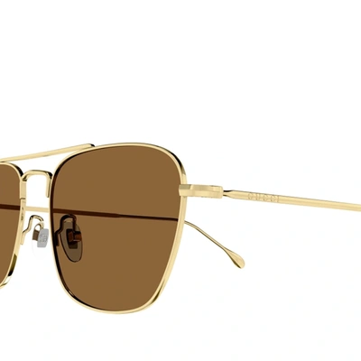 Shop Gucci Metal Sunglasses