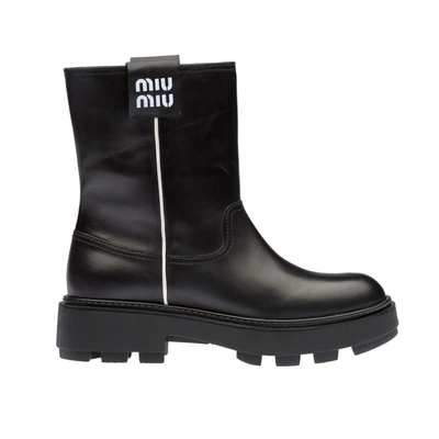 Shop Miu Miu Leather Logo Boots