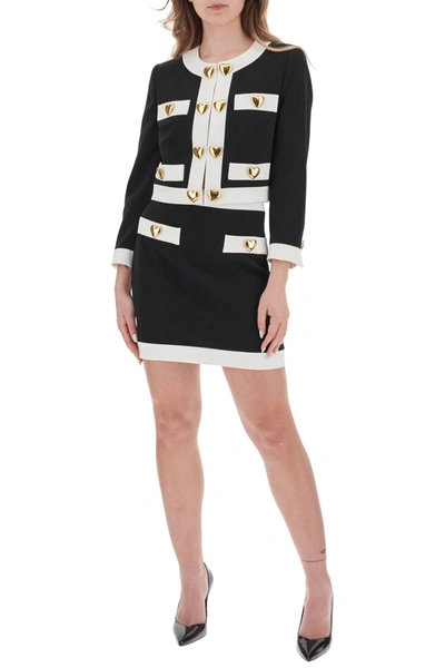 Shop Moschino Mini Skirt With Heart Shaped Buttons