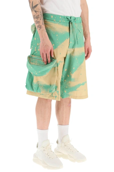 Shop Oamc Smudge Oversized Shorts With Maxi Pockets