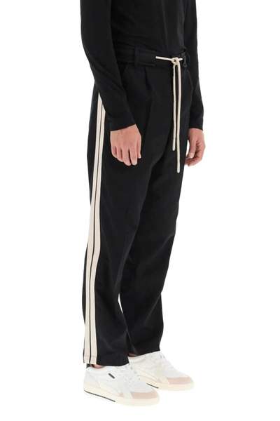 Shop Palm Angels Drawstring Cotton Pants With Side Bands
