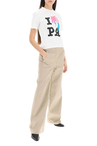 Shop Palm Angels Reversed Waistband Chino Pants