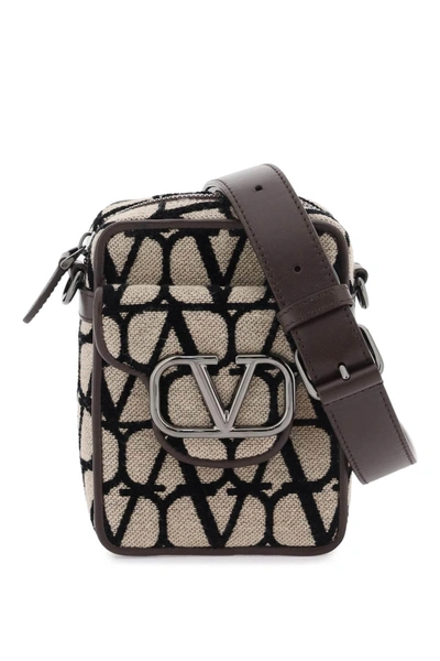 Shop Valentino Garavani Mini Locò Toile Iconographe Crossbody Bag