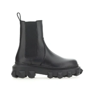 Shop Valentino Garavani  Garavani Trackstud Leather Boots