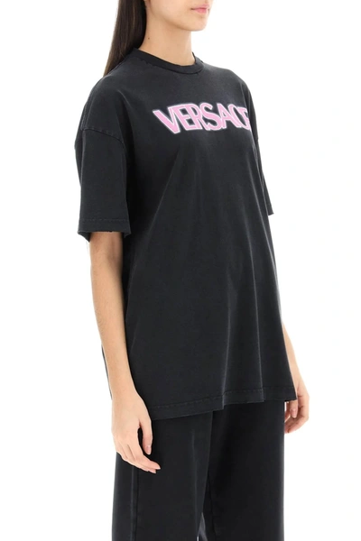 Shop Versace Distressed T Shirt With Neon Logo