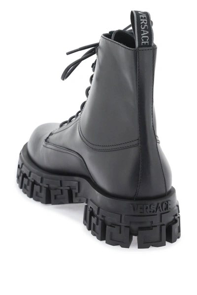 Shop Versace Greca Portico Combat Boots