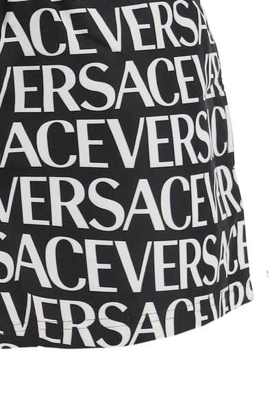 Shop Versace Allover Swim Trunks