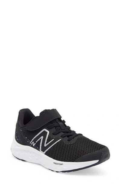 Shop New Balance Kids' Ari Sneaker In Black