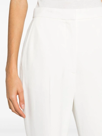 Shop Alexander Mcqueen High Waisted Trousers In Ivory
