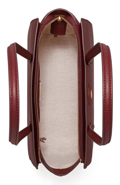 Shop Tory Burch Small Robinson Pebble Leather Tote In Claret