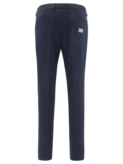 Shop Dolce & Gabbana Tailored Trousers With Plaque