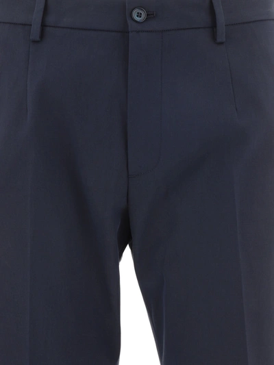 Shop Dolce & Gabbana Tailored Trousers With Plaque