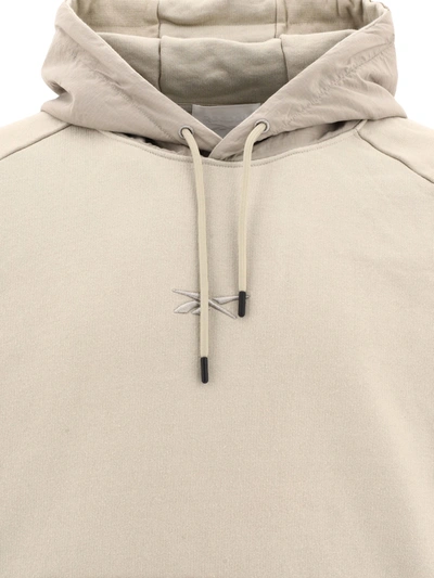 Shop Reebok Woven Blocked Hoodie