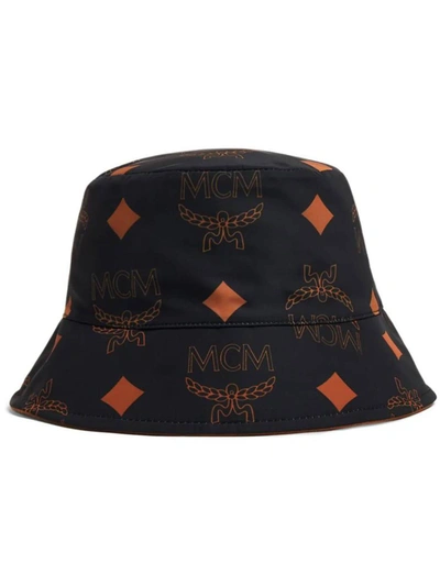 Shop Mcm Hats In Black + Cognac