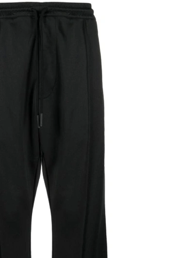 Shop Marcelo Burlon County Of Milan Trousers In Black Anth