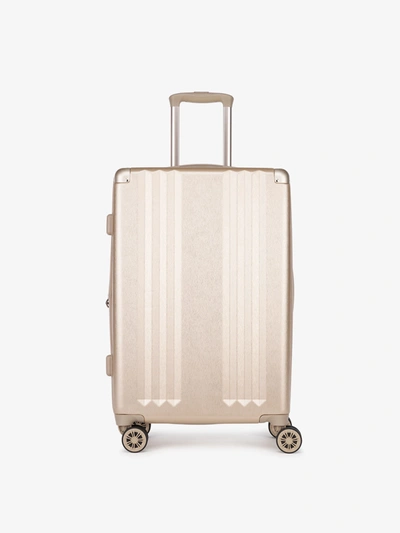Shop Calpak Ambeur Medium Luggage In Gold | 24"