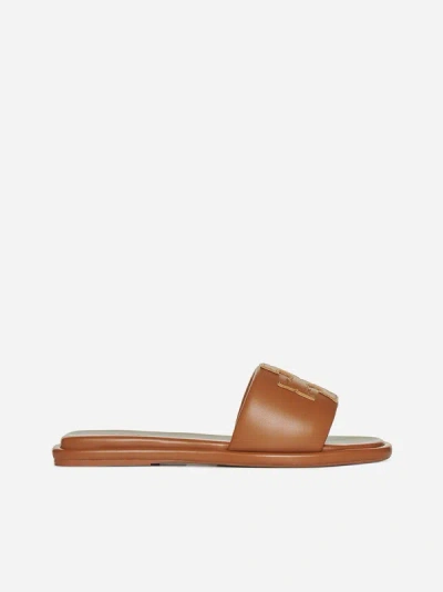 Shop Tory Burch Logo Leather Slides In Bourbon,gold