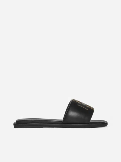 Shop Tory Burch Logo Leather Slides In Perfect Black Gold