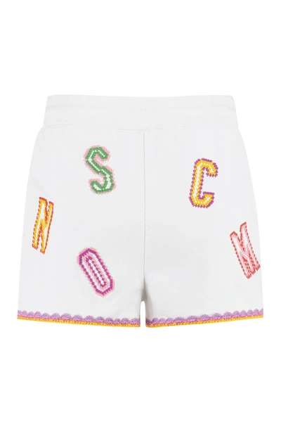 Shop Moschino Embroidered Sweatshorts In White