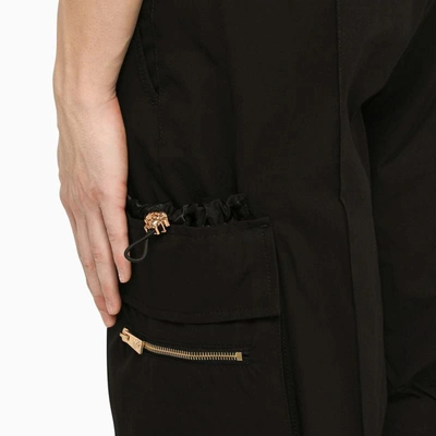 Shop Versace Cargo Trousers In Black