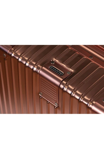 Shop Champs Aluminum Hardside Spinner Suitcase In Rose Gold